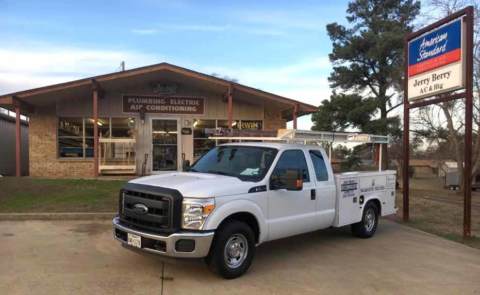 One of the Jerry Berry A/C & Electric work trucks outside our AC repair office in Linden TX